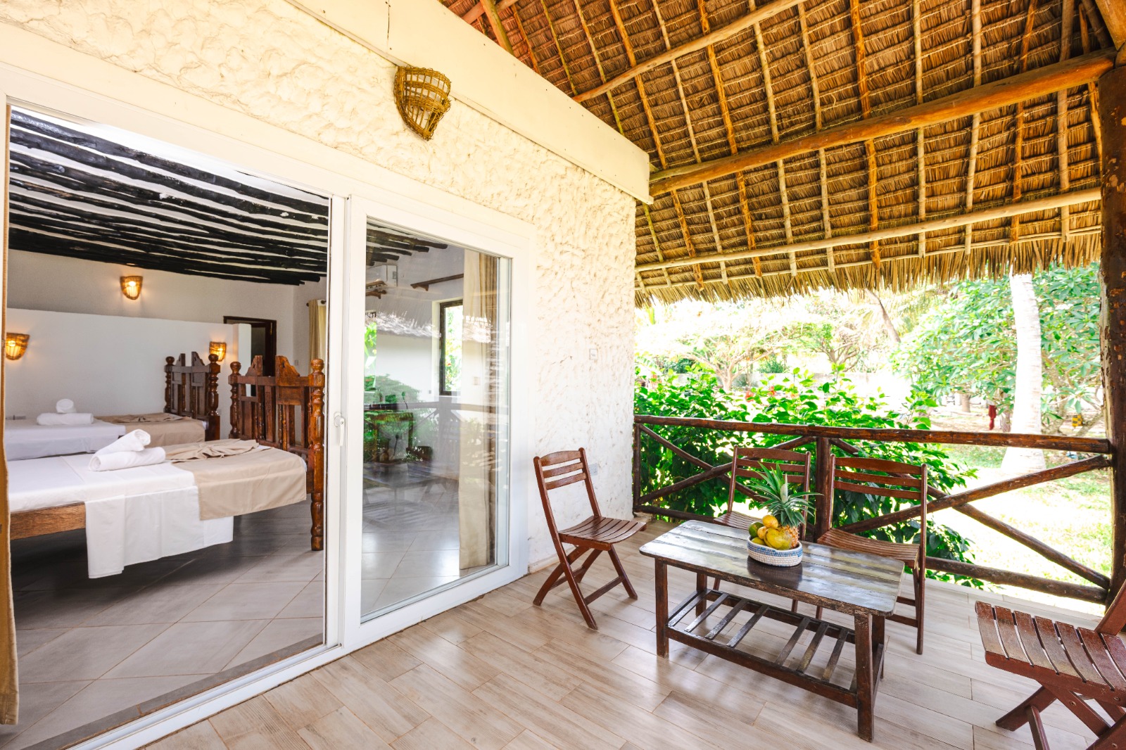 Family room veranda with two beds beyond